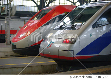 Tizalpino and Eurostar Italy while Milan Central Station is parked Tizalpino and Eurostar Italy while Milan Central Station is parked 2401768