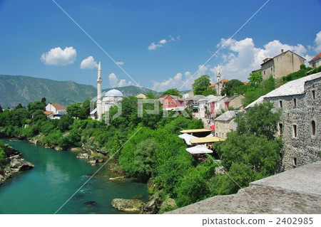 The left bank of the Neretva River of World Heritage Mostar, lined with stone houses 2402985
