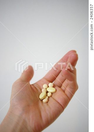 Hand and medicine 2406357