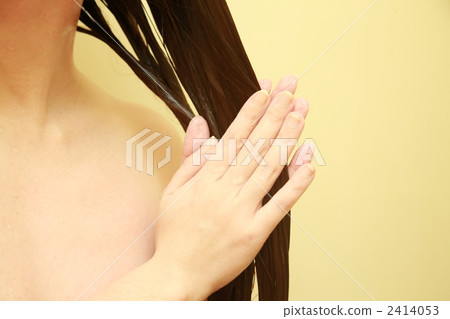 A woman wearing a conditioner A woman wearing a conditioner 2414053