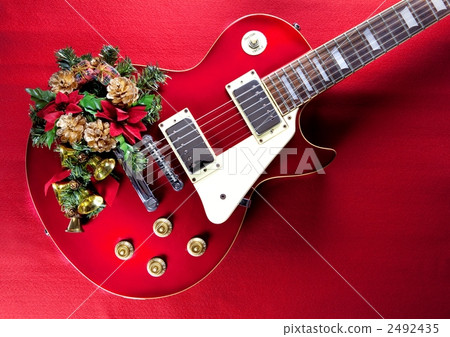 Red guitar with Christmas lease Red guitar with Christmas lease 2492435