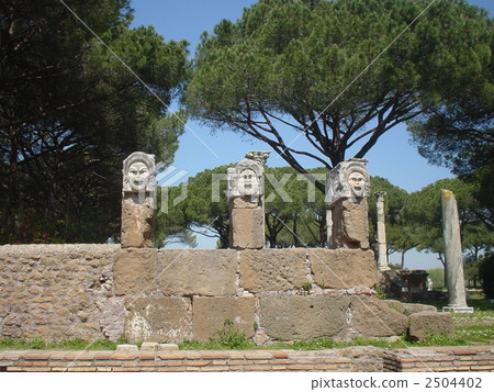 Facial sculpture at the theater of Ostia Antica, one of the foremost trade ports of ancient Rome Facial sculpture at the theater of Ostia Antica, one of the foremost trade ports of ancient Rome 2504402
