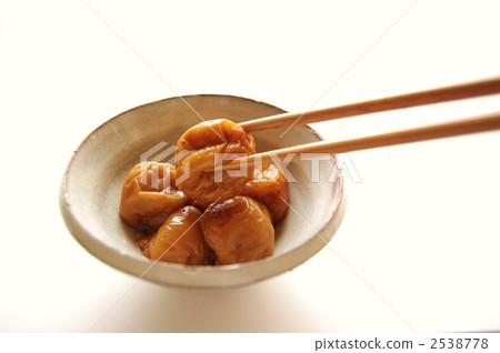 Umeboshi held with chopsticks 2538778