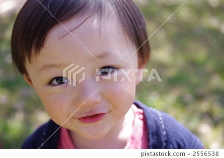 Child with a gentle smile Child with a gentle smile 2556538