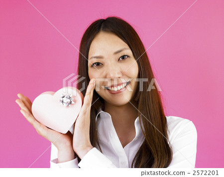 A woman with a present A woman with a present 2572201