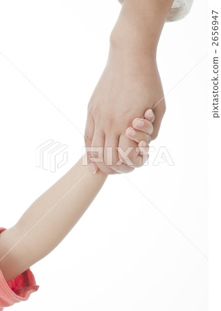 Parent and child connecting hands 2656947
