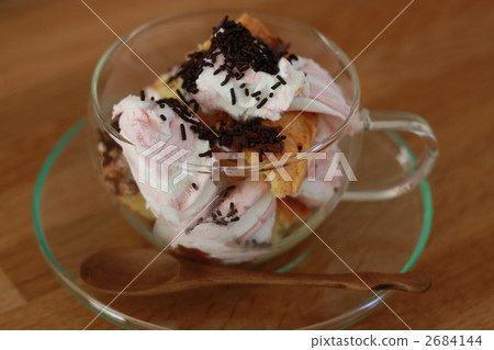 Strawberry mixed ice cream trifle made in a teacup 2684144