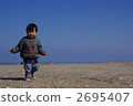 Infants and sandy beach 2695407