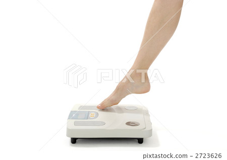 A young woman riding a scale A young woman riding a scale 2723626