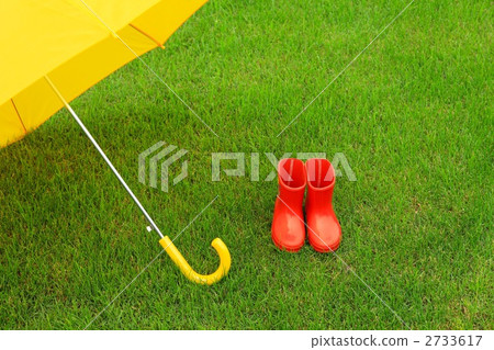 Yellow umbrella and red boots 2733617