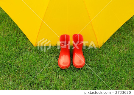 Yellow umbrella and red boots 2733620