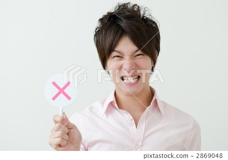 A male in her twenties with a crossed plate A male in her twenties with a crossed plate 2869048