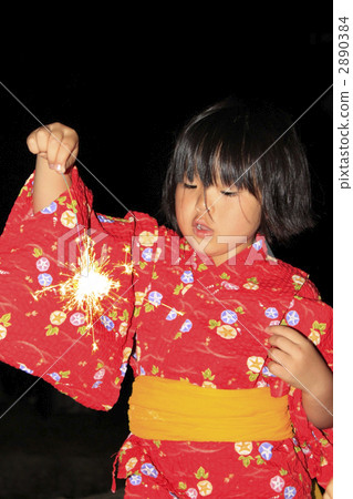 A girl playing a spider fireworks A girl playing a spider fireworks 2890384