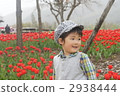 Red tulip fields and children 2938444