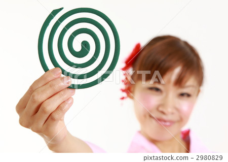 A woman in a yukata with a mosquito coil 2980829