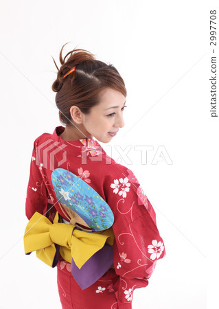 A woman in a yukata A woman in a yukata 2997708