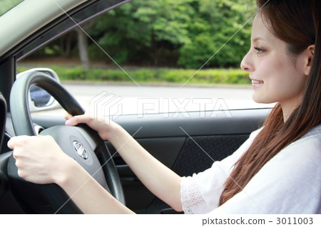 One woman (car car passenger car driver's license drive leisure transport driver) One woman (car car passenger car driver's license drive leisure transport driver) 3011003