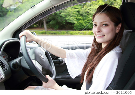 One woman (car car passenger car driver's license drive leisure transport driver) 3011005