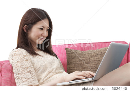 A woman enjoying the Internet 3026440