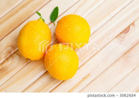 Lemon on a wooden desk 3062684