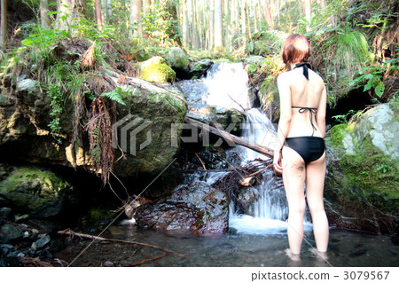 A swimwear girl inside a mountain 3079567