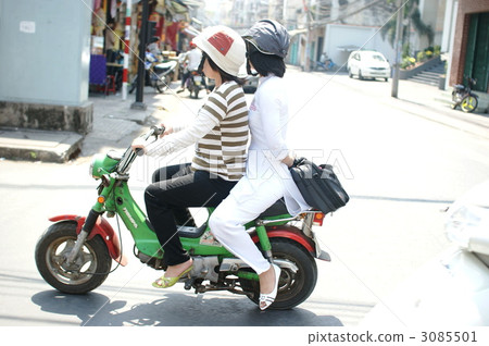 Everyday landscape of Vietnam Two-seater motorbike / Ho Chi Minh Everyday landscape of Vietnam Two-seater motorbike / Ho Chi Minh 3085501