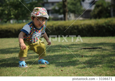 Boys playing on the lawn Boys playing on the lawn 3106671