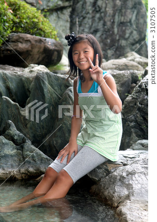 A girl in a hot spring footbath A girl in a hot spring footbath 3107505