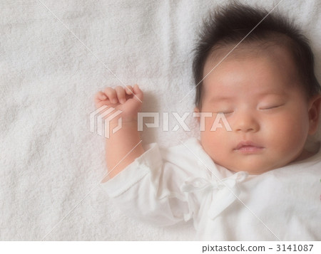 Sleeping baby from the front Sleeping baby from the front 3141087