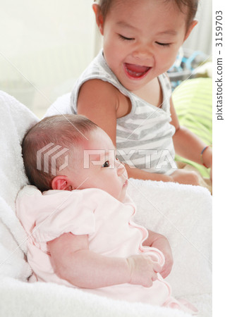 Two months old baby and two years old girl 3159703