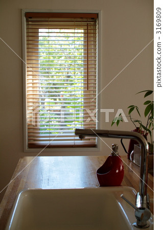 Outside the window seen through the island kitchen: Custom kitchen 3169809