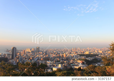 An urban area illuminated by the morning sun 3197157