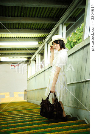 Stairway of a female station of a traveling alone Stairway of a female station of a traveling alone 3204614