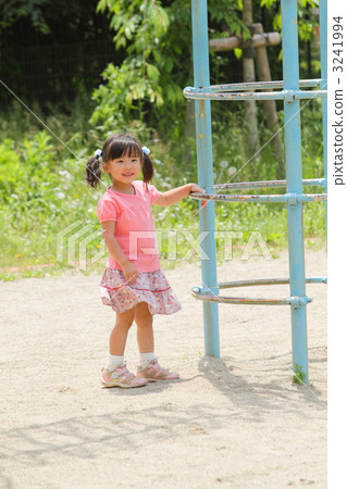 Girls playing with park play equipment Girls playing with park play equipment 3241994