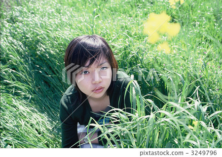 Female in her twenties in grassland 3249796