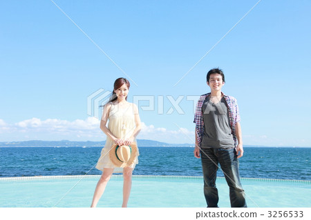 Poolside vacation couple image Poolside vacation couple image 3256533