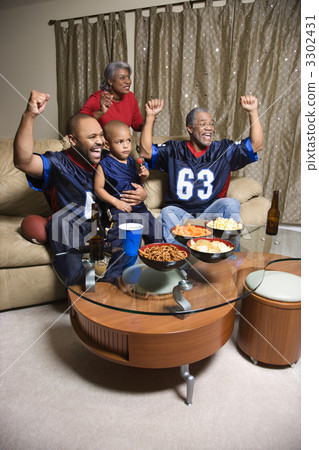 Family watching sports. 3302431