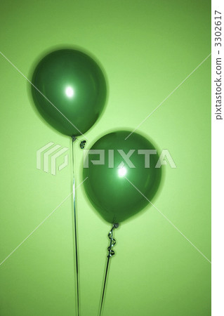 Two green balloons. Two green balloons. 3302617