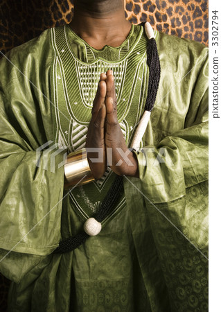 Man wearing African clothes. 3302794