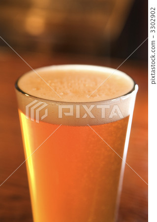 Glass of Beer With Foam Glass of Beer With Foam 3302902