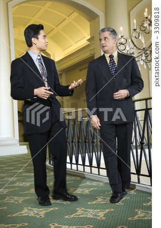 Two businessmen in hotel. Two businessmen in hotel. 3309818