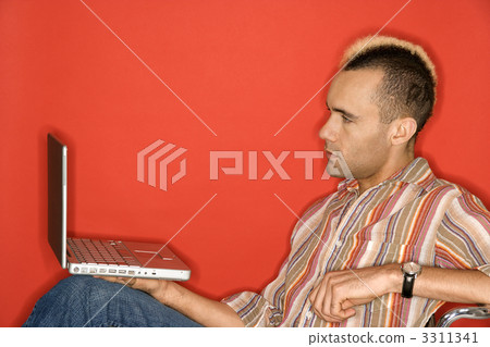 Man holding laptop computer. Man holding laptop computer. 3311341