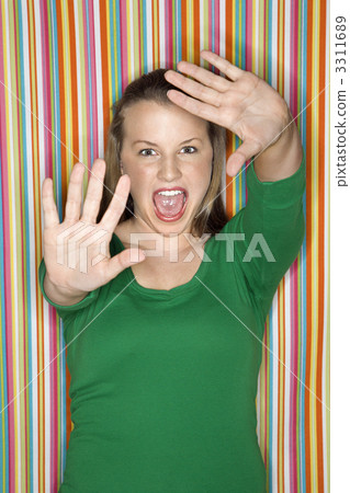 Woman making facial expression. Woman making facial expression. 3311689