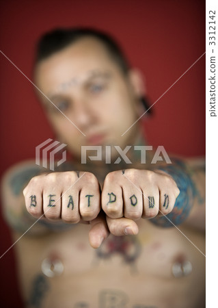 Man with tattoos. 3312142