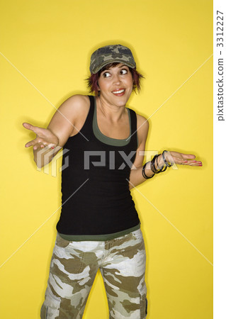 Pretty latina woman shrugging shoulders. Pretty latina woman shrugging shoulders. 3312227