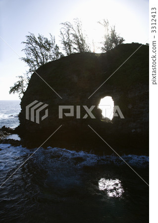 Rock in ocean. 3312413