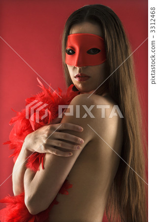 Woman in boa and mask. Woman in boa and mask. 3312468