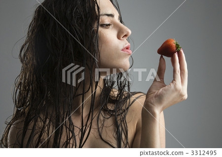 Woman holding strawberry. Woman holding strawberry. 3312495