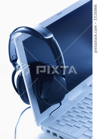 Headphones Hanging on Screen of Laptop. Isolated. Headphones Hanging on Screen of Laptop. Isolated. 3316866