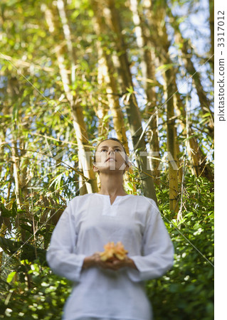 Woman Holding Flower Outdoors Woman Holding Flower Outdoors 3317012
